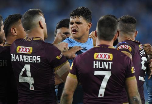 Latrell Mitchell gets under the noses of the Queenslanders. Picture: AAP