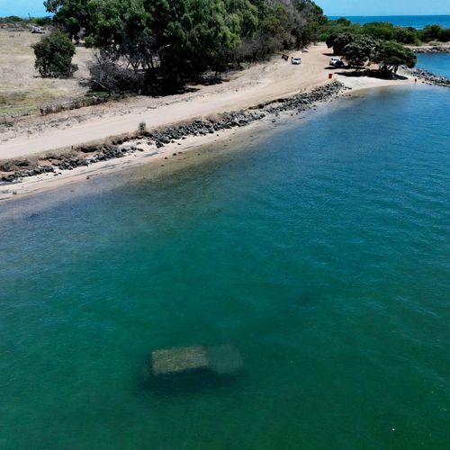 A mystery from the deep has befuddled locals in Bunbury, WA, after an unidentified sunken car was found submerged in the water.