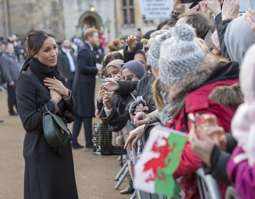 Ms Markle was greeted with plenty of cheers at Cardiff Castle. (AAP)