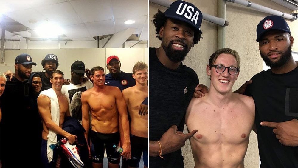Michael Phelps and Mack Horton pose with the Dream Team. (Instagram)