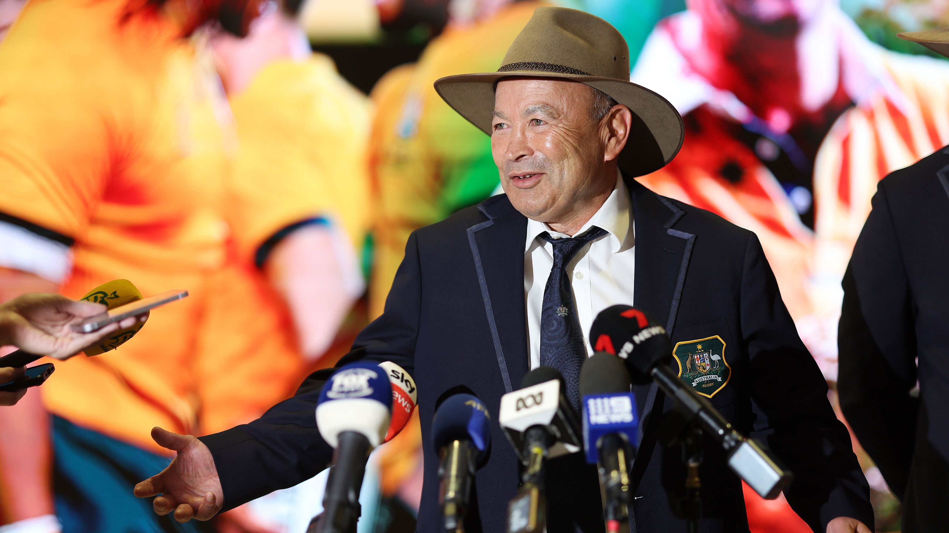 Wallabies head coach Eddie Jones speaks to media at Sydney International Airport.