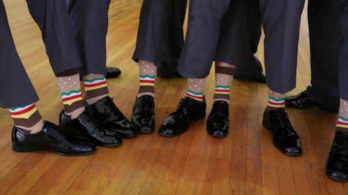 Even the socks fit the theme. (Getty)