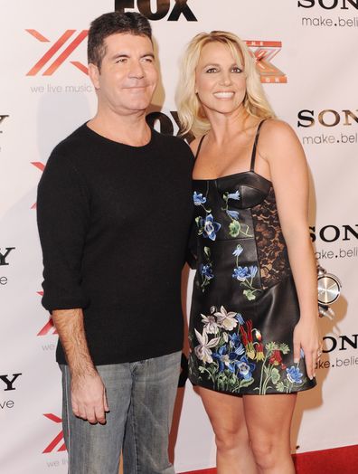 Britney Spears and Simon Cowell arrive at The X-Factor Viewing Party in 2012.