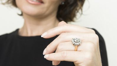 Woman engagement ring on hand