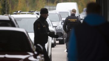 Finnish border guards check the cars at the Vaalimaa border check point between Finland and Russia in Virolahti, Eastern Finland Wednesday, Sept. 28, 2022. 