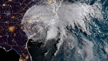 This satellite image provided by NOAA shows Hurricane Florence on the eastern coast of the United States.