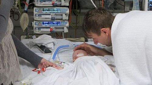 Greg and Catherine Hughes say a heartbreaking goodbye to their son in hospital.