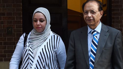 Dr Khalid Qidwai (right), the husband of Shahnaz Qidwai, departing the NSW Supreme Court in Sydney, 2014. (AAP)