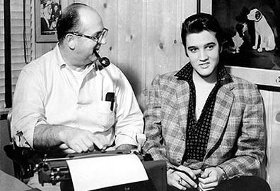 Colonel Tom Parker and Elvis Presley in 1956 (Getty)