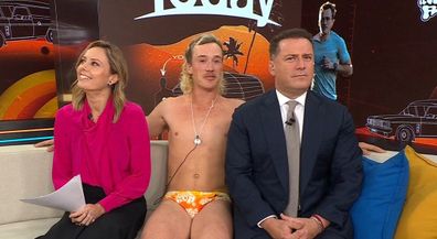 The tradie stripped down to his budgie smugglers and socks to tell Karl and Ally all about his next goal.