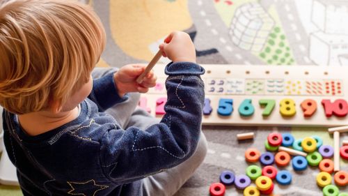 Preschool childcare centre toddler playing early education learning children