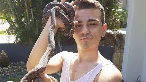 Nathan Chetcuti with another of his pet reptiles. (Image: Supplied)