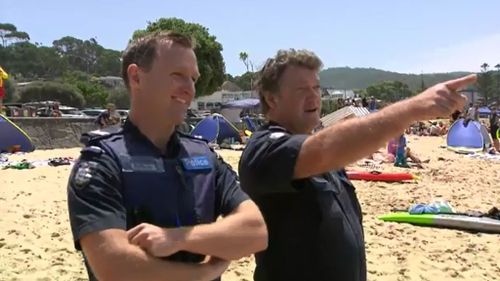 The pair also rescued two teenage girls struggling in a rip on December 15. (9NEWS)