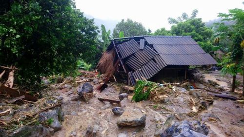 Flash floods damage a house in northern province of Hoa Binh, Vietnam. (Nhan Sinh/Vietnam News Agency via AP)