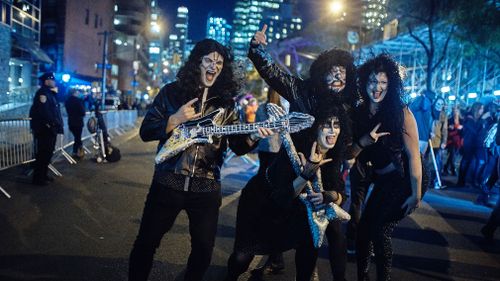 A group of New Yorkers dressed as glam-rock band, Kiss. (AP)