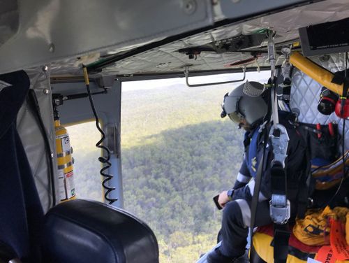 The RACQ Capricorn Rescue helicopter joined a wide-scale search for the downed gyrocopter. (9NEWS)