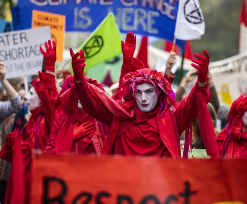 Activists from Extinction Rebellion participate in a protest in Perth, Friday, October 11, 2019.