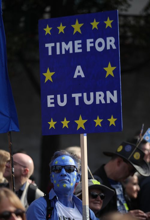 Marchers chanted “People’s vote!” and brandished signs with slogans like “bollocks to Brexit”, "the wrexiteers" and "Brexit stole my future”. 