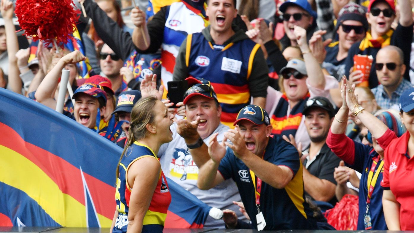 Danielle Ponter of the Crows celebrates after scoring a goal 