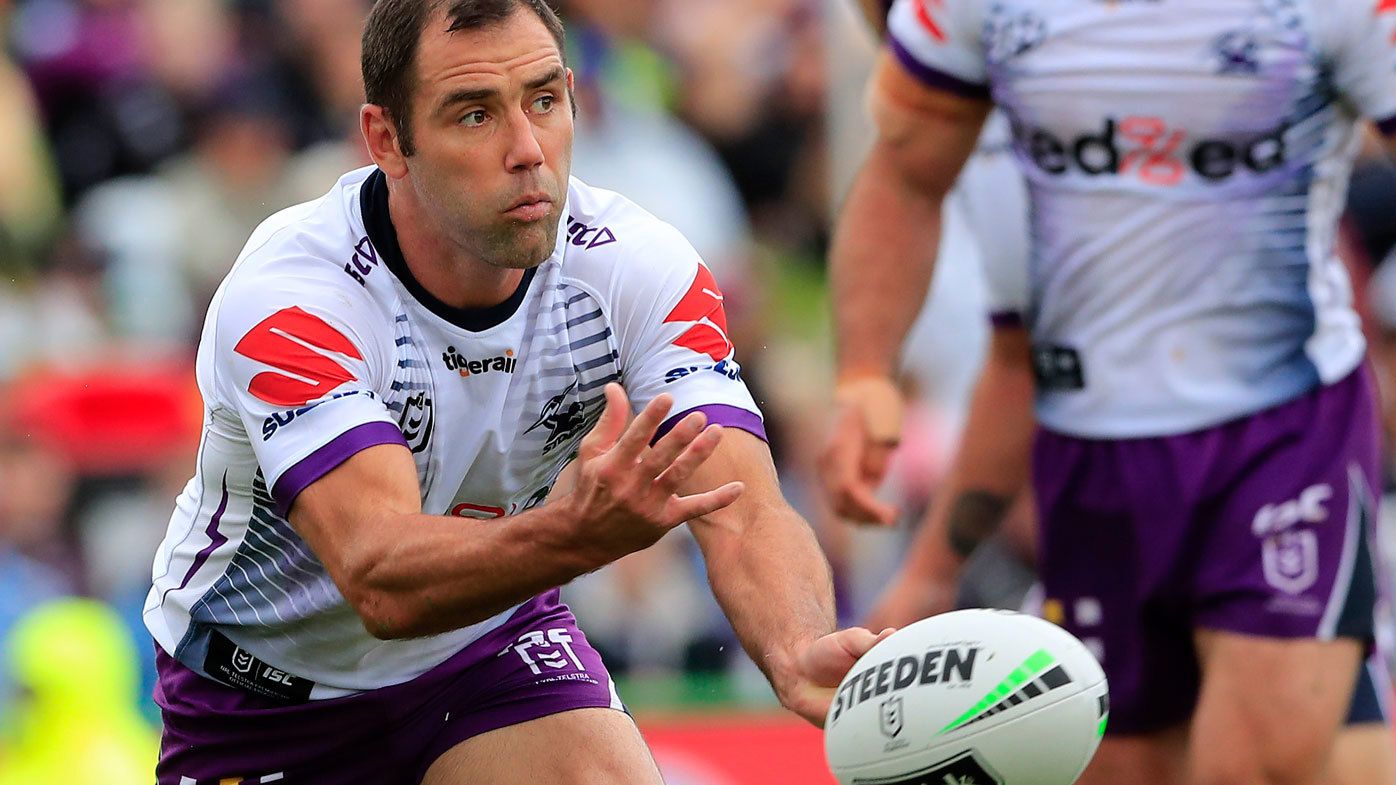  Cameron Smith of the Storm passes the ball during the round 1 NRL match between the Manly Sea Eagles and the Melbourne Storm 