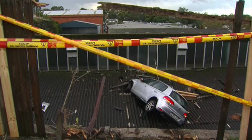 Emergency crews on scene after car crashes into Leichhardt roof