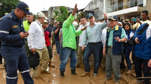 President Juan Manuel Santos visits landslide-struck Mocoa. (AFP)