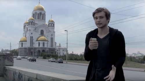Footage shows the Russian outside the church before heading inside to film himself playing Pokemon Go. (YouTube)