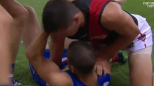 McKenna allegedly bit Dickson during the tackle. (Fox Sports)