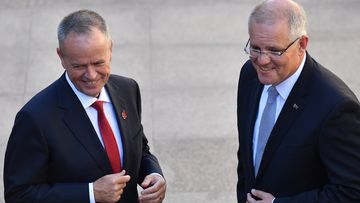 Opposition leader Bill Shorten and Scott Morrison attend the Last Post Ceremony at the Australian War Memorial in Canberra yesterday.