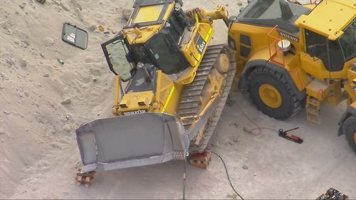 A man has been killed after a bulldozer rolled at the Port of Brisbane this morning.