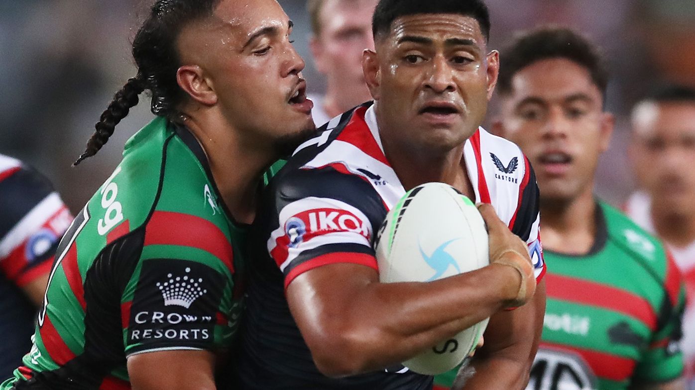 Daniel Tupou of the Roosters is tackled during a match against Souths earlier this year.