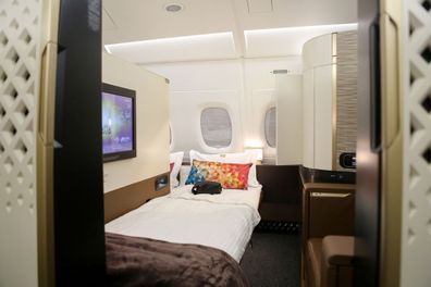 Etihad Airways' first class apartment, featuring a lie flat bed, big screen TV, lounge