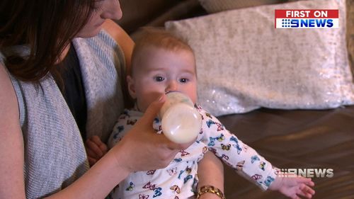 Queensland mum Emily Martin says she always tries to keep an extra tin on hand for her daughter Eve, just in case. (9NEWS)