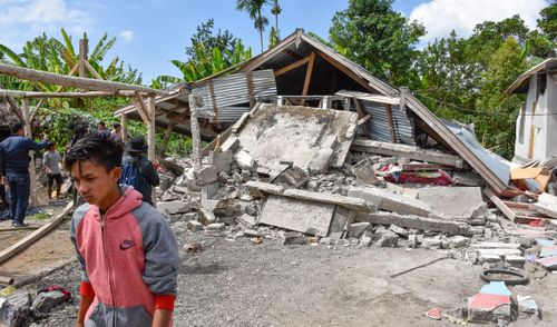 Many houses and businesses were destroyed in the quake. Image: AAP