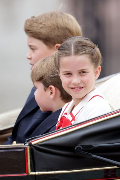 Princess Charlotte smiles at well-wishers