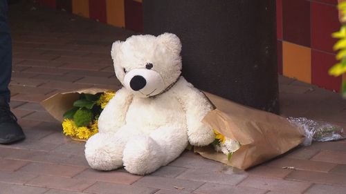 Flowers have been laid at unit where a toddler was found dead on Wednesday afternoon.