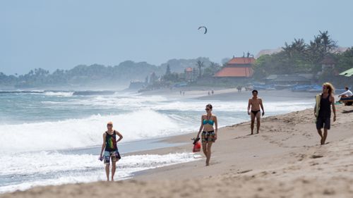 Tourists at the beach in Bali