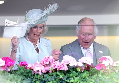 King Charles II and Queen Camilla watch their horse Desert Hero win as they attend day three of Royal Ascot 2023 at Ascot Racecourse on June 22, 2023 in Ascot, England 