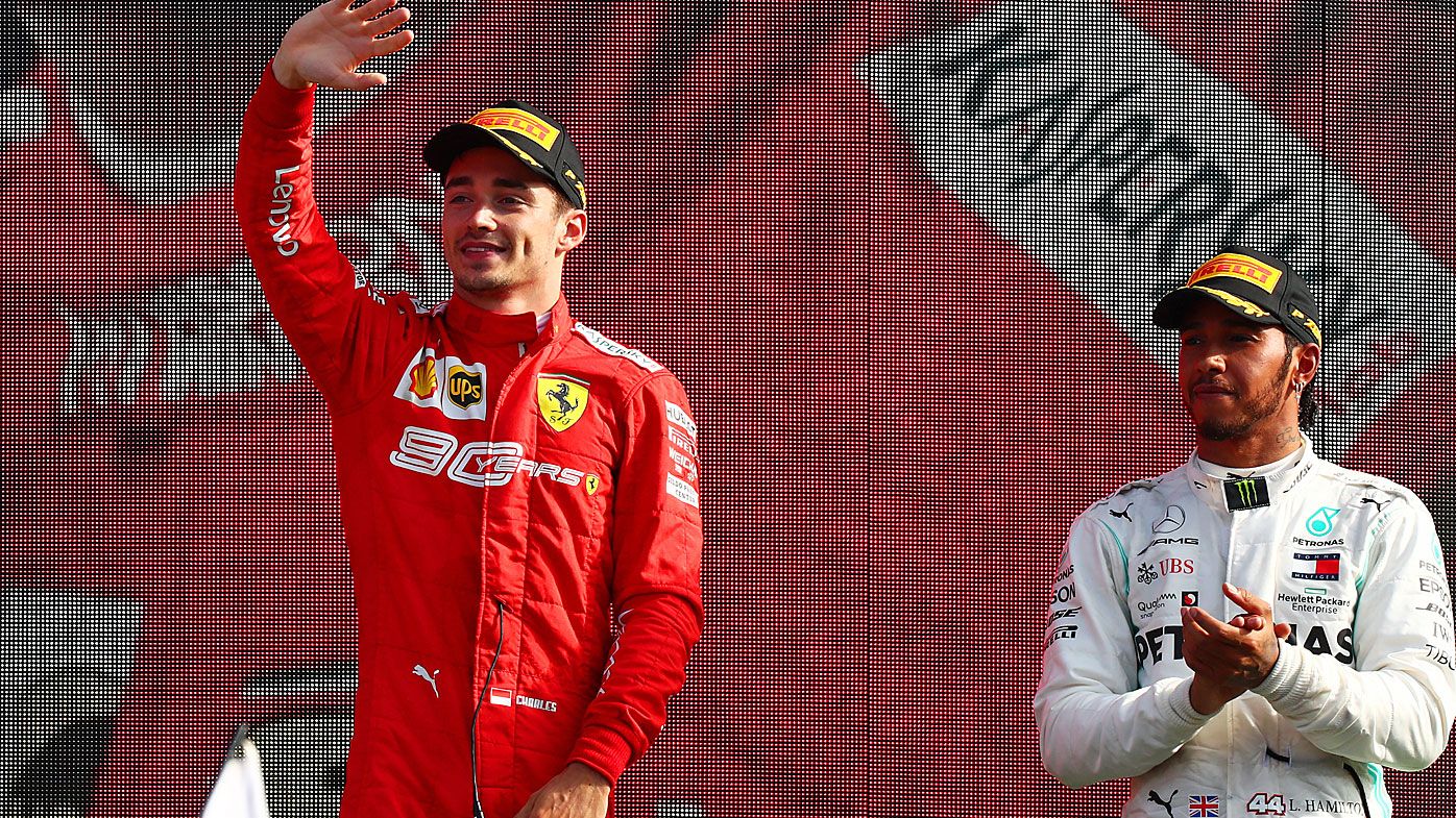 Race winner Charles Leclerc of Monaco and Ferrari is applauded by third placed Lewis Hamilton 