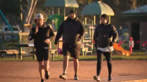 Those intent on a morning walk had no choice but to rug up in puffer jackets and beanies in Melbourne today. 