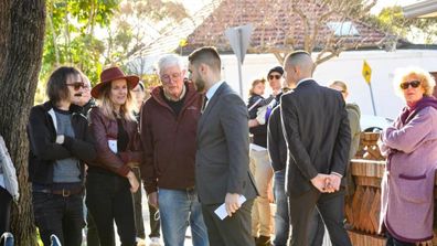 Auction auctioneer bidders bidding Sydney real estate agent Domain house housing market