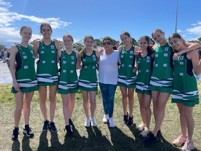 Helen Ryan coaching with her Division 5 under 15's netball team for Randwick Rugby Netball Club on their grand final day.