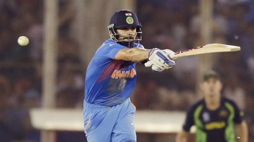 India's Virat Kohli bats during their ICC World Twenty20 2016 cricket match against Australia in Mohali, India. (AAP)