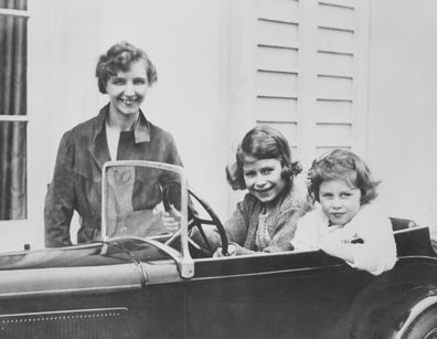 Princess Elizabeth (later Queen Elizabeth) and her younger sister Princess Margaret with their governess, Marion Crawford.