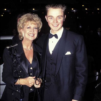 Matthew Newton poses with his mother Patti Newton in 1997.