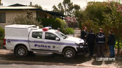 Police allege the killing happened over a fence dispute and stormwater runoff.