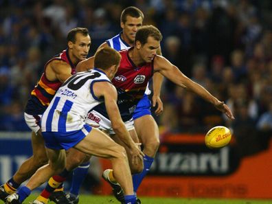 Wayne Carey #2 for the Crows in action during the round six AFL match between the Kangaroos and Adelaide Crows at the Telstra Dome in Melbourne, Australia on May 2, 2003. (Photo by Sean Garnsworthy/Getty Images)