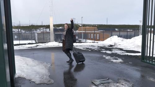 Ms Walker waves farewell to her supporters.