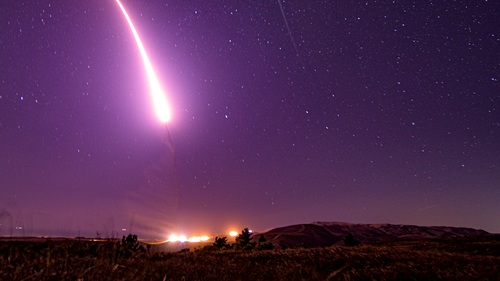 This image taken with a slow shutter speed on Oct. 2, 2019, and provided by the U.S. Air Force shows an unarmed Minuteman 3 intercontinental ballistic missile test launch at Vandenberg Air Force Base, Calif. The Pentagon has raised to $95.8 billion the estimated cost of fielding a new fleet of land-based nuclear missiles to replace the Minuteman 3 (Staff Sgt. J.T. Armstrong/U.S. Air Force via AP)