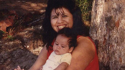 Texas death row inmate Melissa Lucio is holding one of her sons, John. 